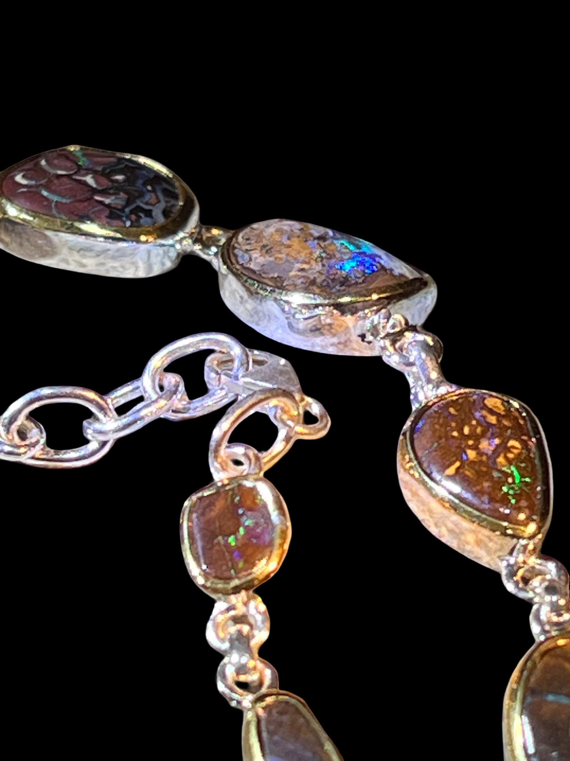 9 Boulder Opale in 18Kt Goldvermeil Fassung Gliederarmband deutsche Handarbeit
