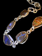 9 Boulder Opale in 18Kt Goldvermeil Fassung Gliederarmband deutsche Handarbeit