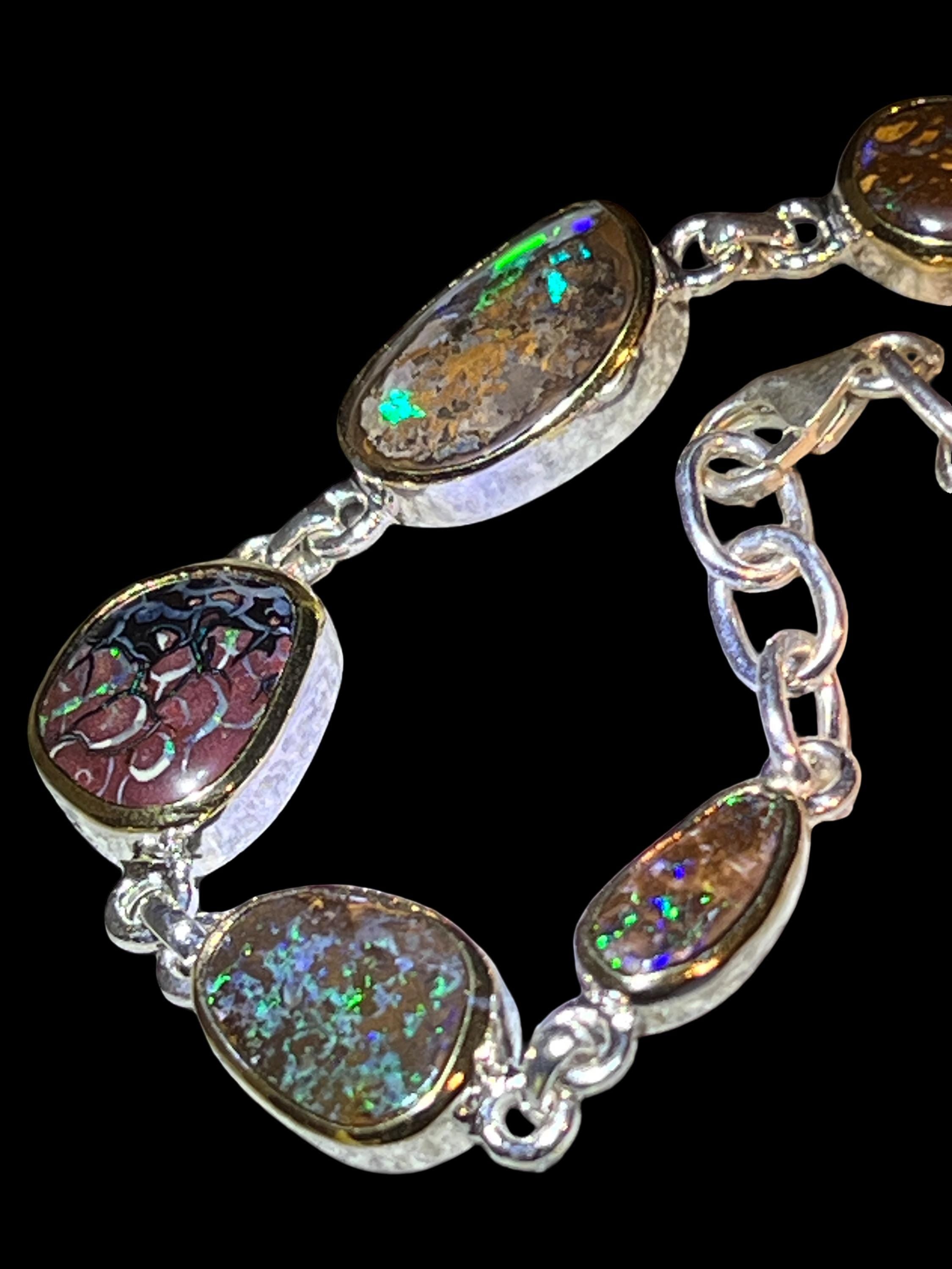 9 Boulder Opale in 18Kt Goldvermeil Fassung Gliederarmband deutsche Handarbeit