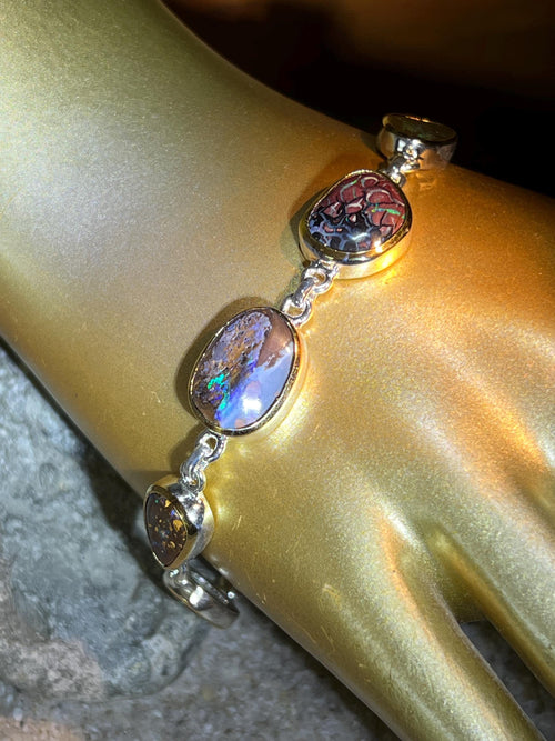 9 Boulder Opale in 18Kt Goldvermeil Fassung Gliederarmband deutsche Handarbeit