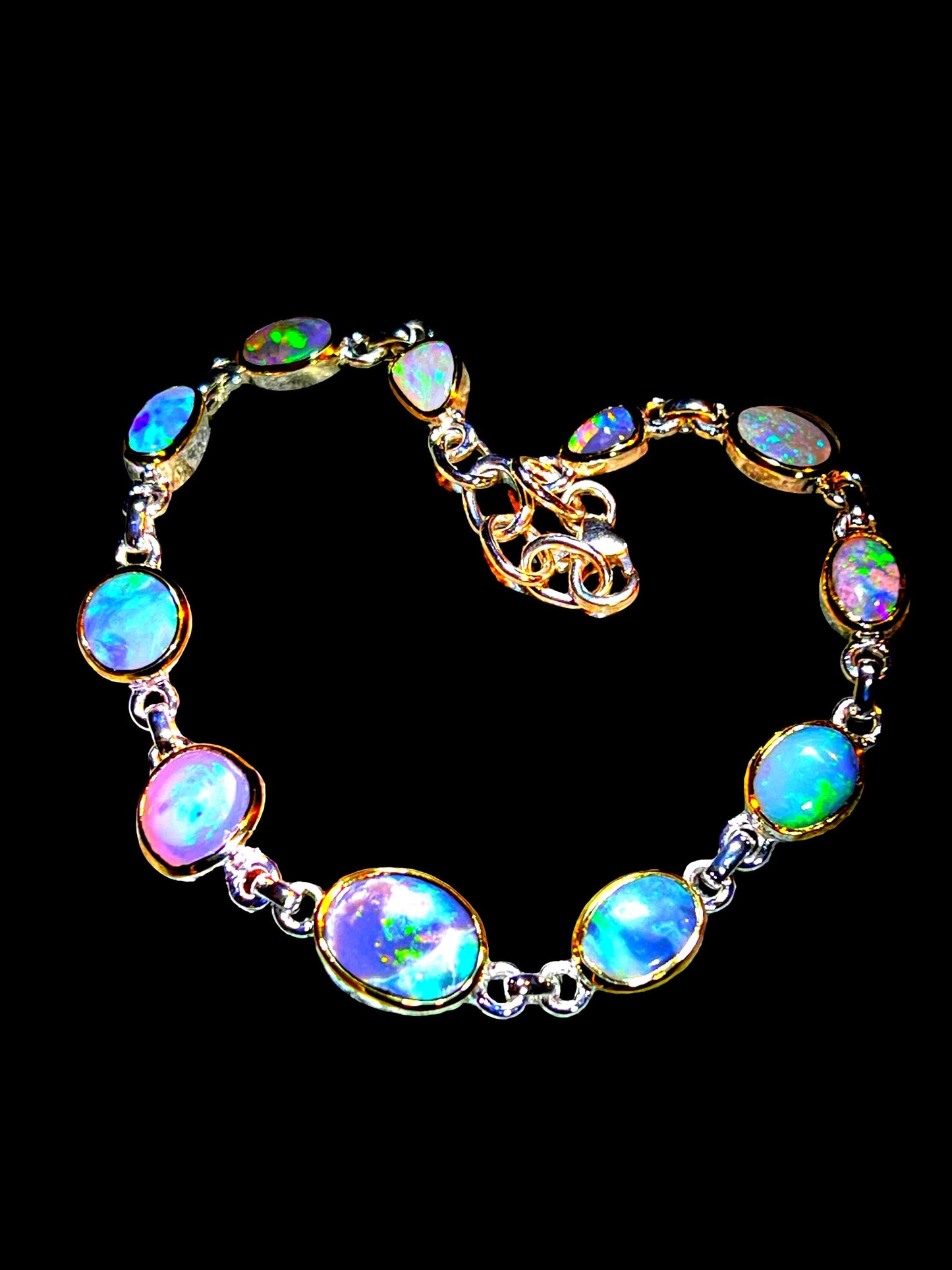 Boulder Opal Armband 11 schöne Opale in 18Kt Goldvermeil Fassung