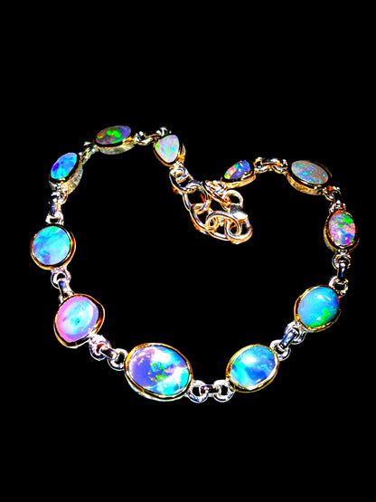 Boulder Opal Armband 11 schöne Opale in 18Kt Goldvermeil Fassung