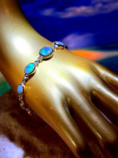 Boulder Opal Armband 11 schöne Opale in 18Kt Goldvermeil Fassung