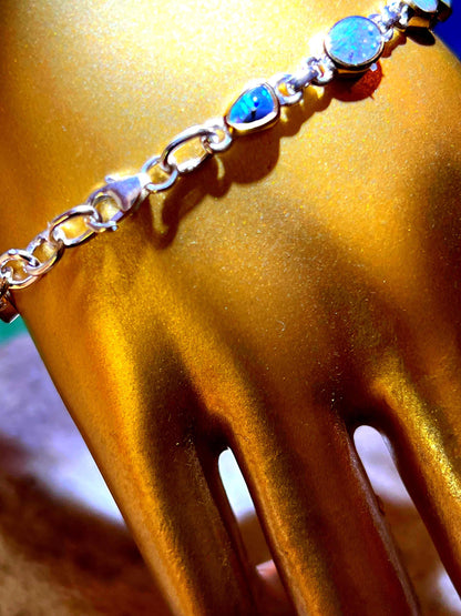 Boulder Opal Armband 11 schöne Opale in 18Kt Goldvermeil Fassung