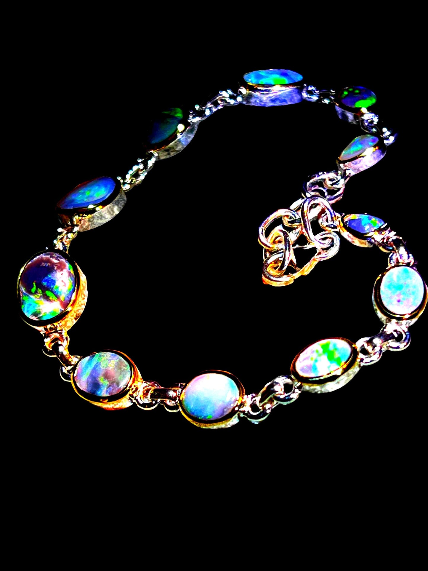 Boulder Opal Armband 11 schöne Opale in 18Kt Goldvermeil Fassung
