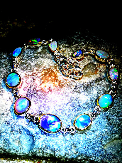 Boulder Opal Armband 11 schöne Opale in 18Kt Goldvermeil Fassung